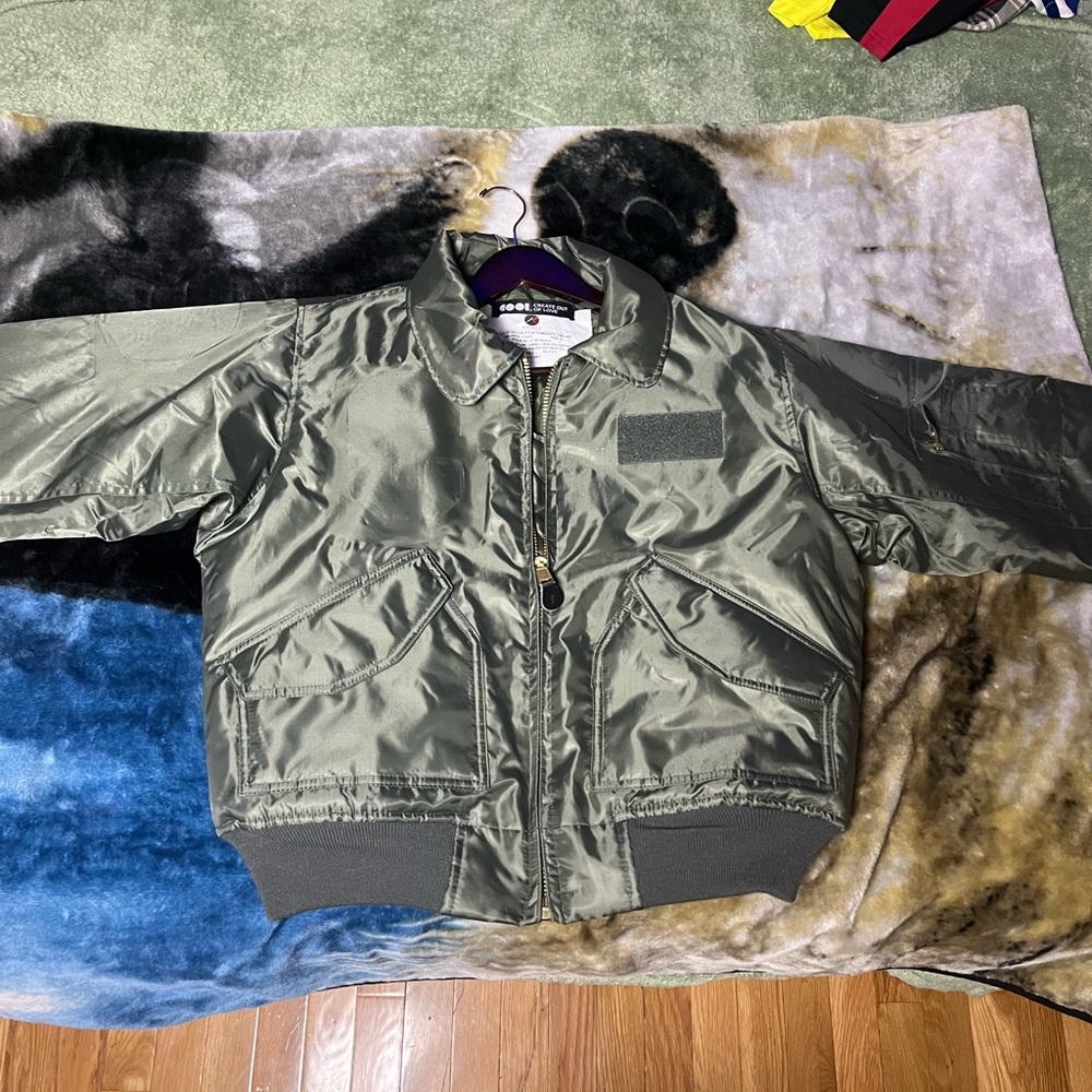 Olive Green Bomber Jacket from COOL, never worn, perfect condition